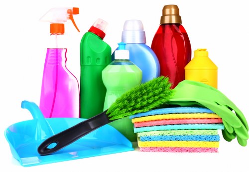 Cleaning professional preparing to start a booked service
